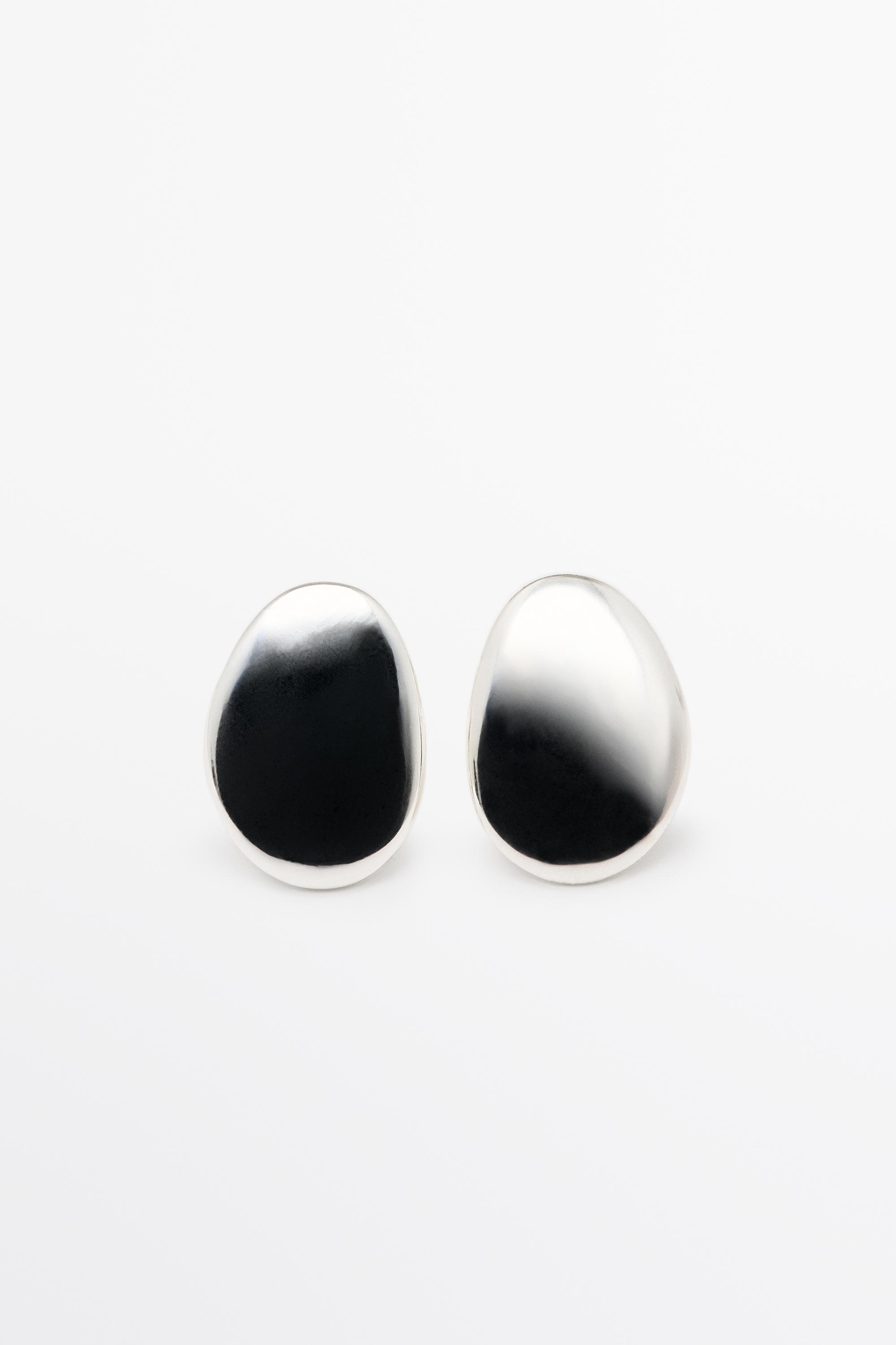 Boucle d'oreille plate irrégulière